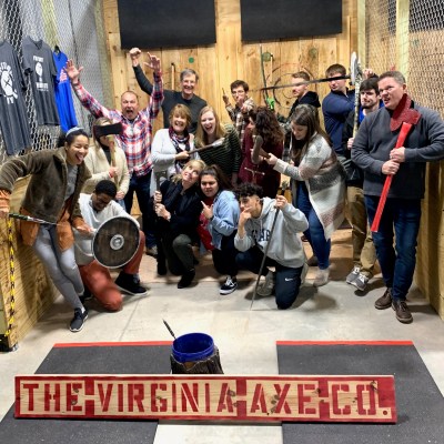 a group of people on a sidewalk