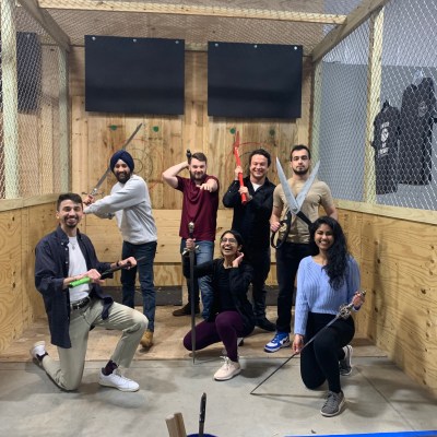 a group of people standing in front of a building