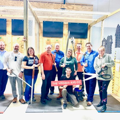 group of people at axe throwing