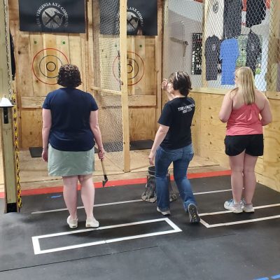 a group of people walking down the street