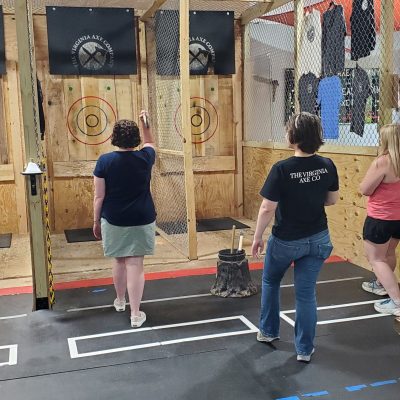 a group of people standing in front of a building