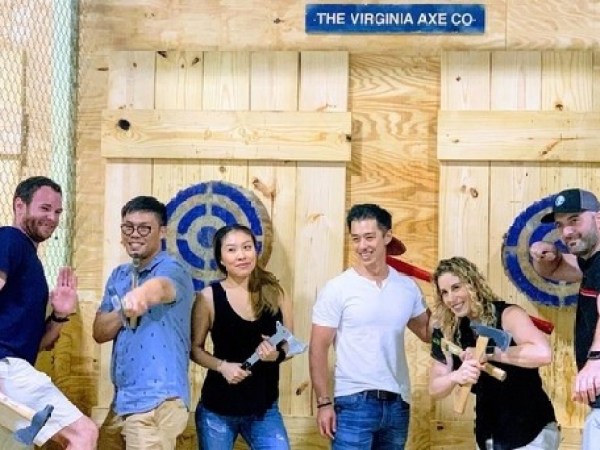 a group of people standing in front of a building