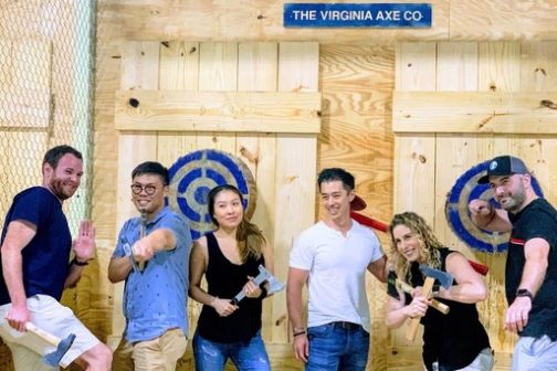 a group of people standing in front of a building